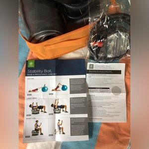 Stability ball with pump and instructions in a little carry case.